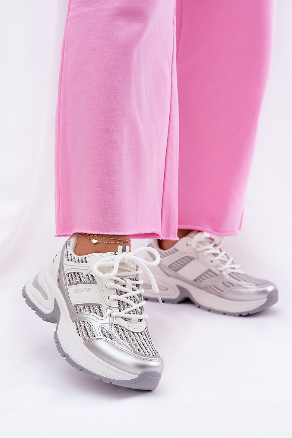 Step in Style luxury women's sneakers displaying premium craftsmanship in eco-leather and a comfortable chunky sole for all-day elegance.