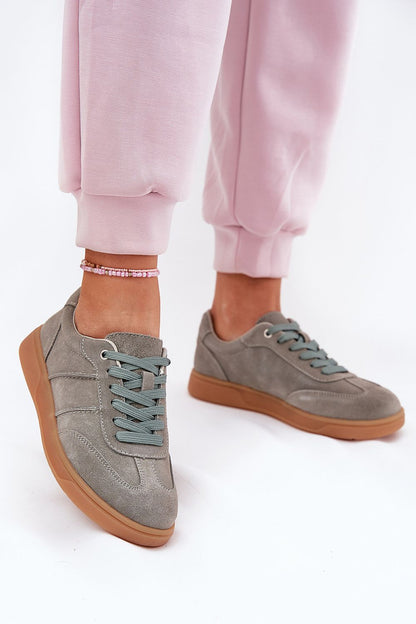 Elegant suede sneakers for women by Step in Style, showcasing a rounded toe design and luxurious comfort for stylish outings.