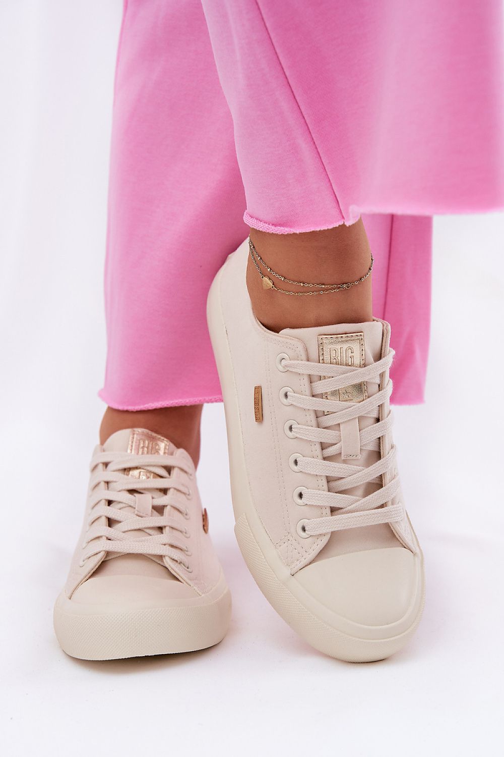 Chic women's sneakers from Step in Style, designed for comfort and style with breathable textile material and a plush footbed for enhanced walking experience.
