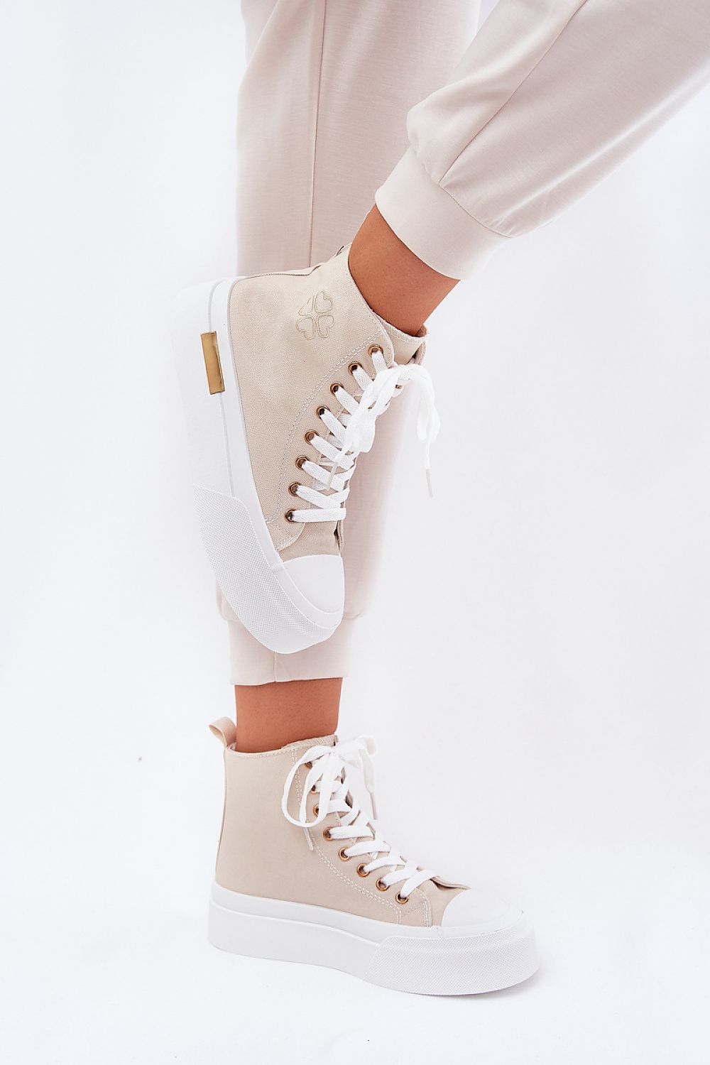 Stylish high-top sneakers for women from Step in Style, showcasing a modern design with a 5cm platform, perfect for casual and sporty outfits.