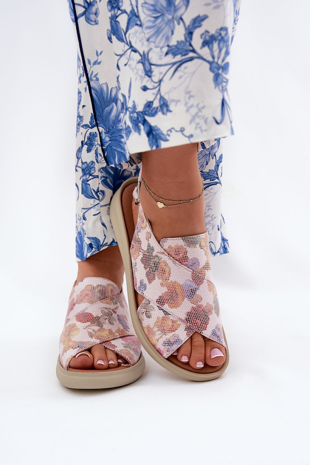 Close-up of Jezzi Women's eco leather sandals featuring interlocking wide straps, designed for comfort and sophistication.