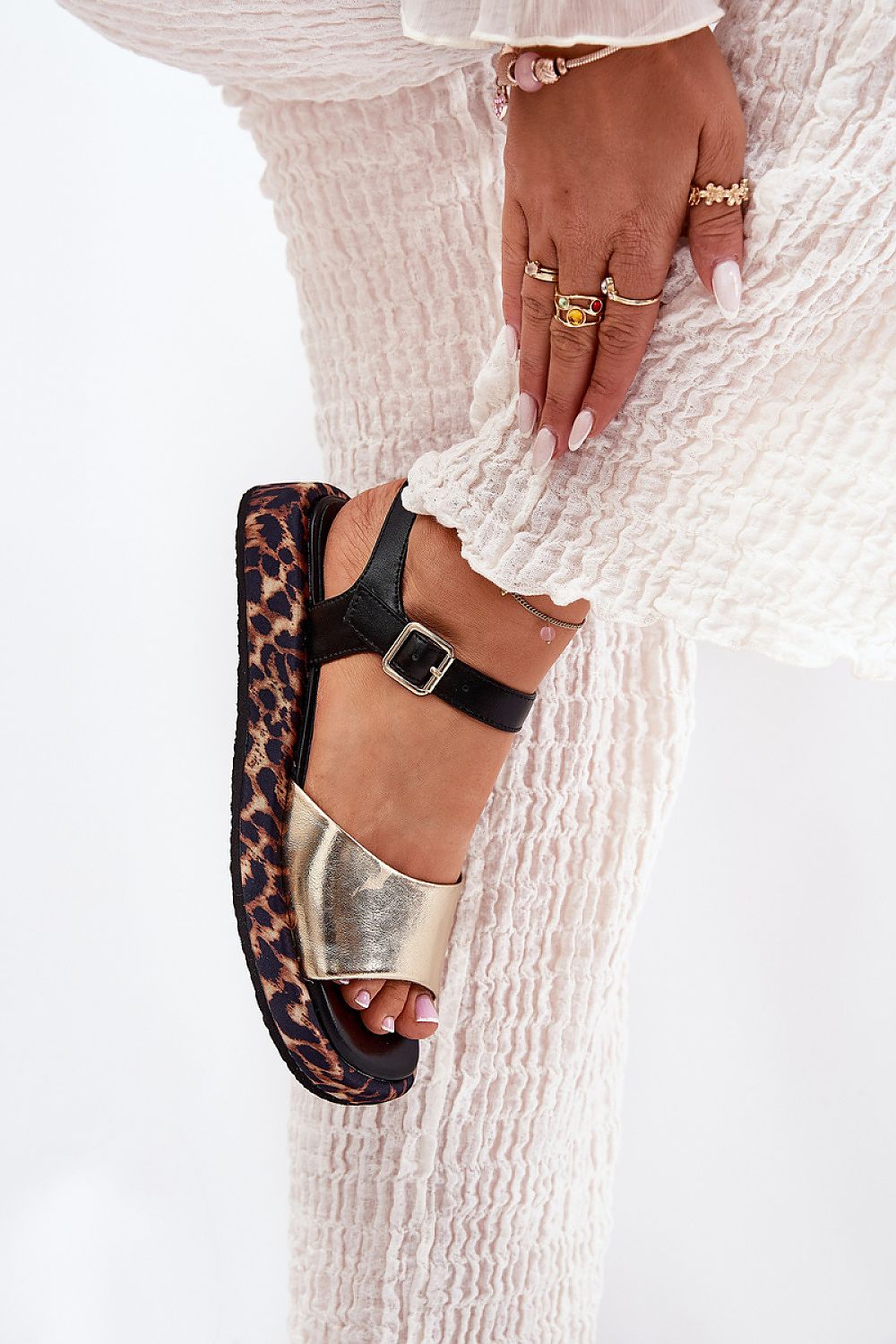 Chic women's sandals in premium natural leather from Step in Style, designed with a trendy animal pattern and a comfortable adjustable strap for a perfect fit.