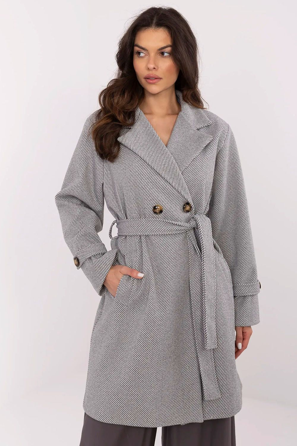 Elegant women's striped coat by Italy Moda featuring shoulder pads and double-breasted fastening, perfect for transitional seasons.