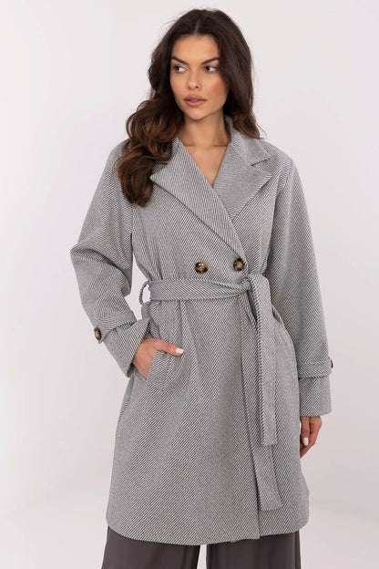 Elegant women's striped coat by Italy Moda featuring shoulder pads and double-breasted fastening, perfect for transitional seasons.