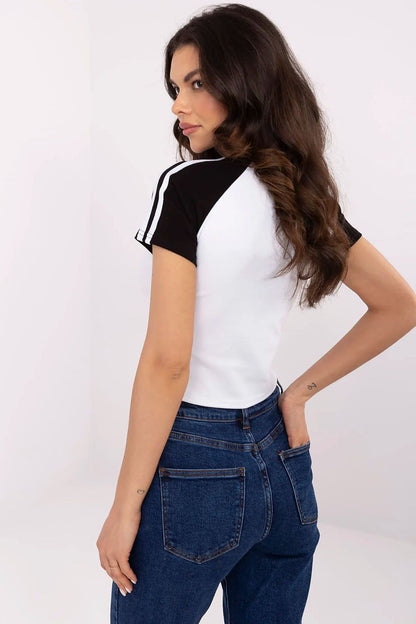 Close-up view of the NM luxury women's T-shirt showcasing detailed embroidery and sequins, perfect for adding elegance to everyday outfits.