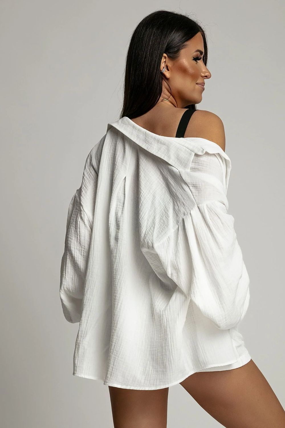 Full ensemble of LaBalancia's black polka dot shirt and high-waisted shorts, exuding a casual yet sophisticated summer style.