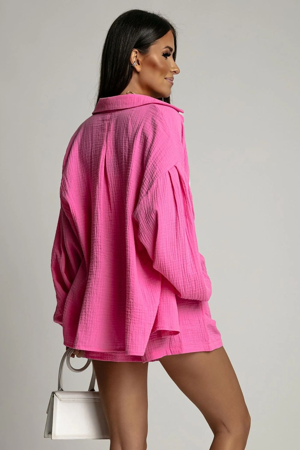 High-waisted shorts from LaBalancia's black polka dot muslin set, showcasing a fashionable tie waist and practical side pockets.