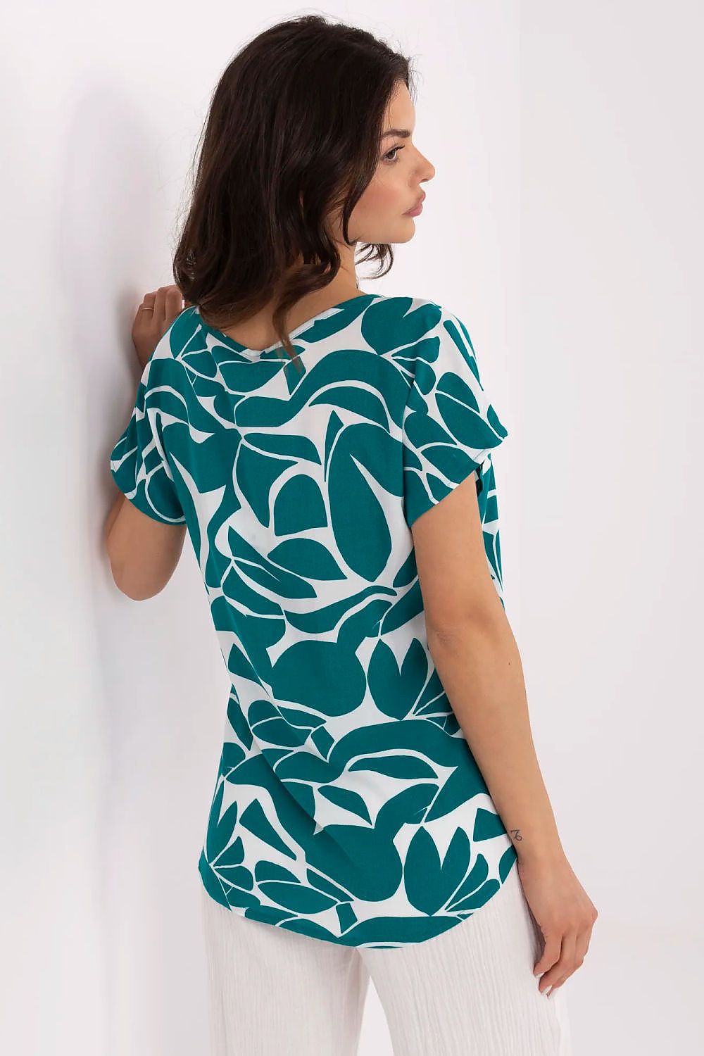 Chic and eco-conscious women's blouse from Sublevel, ideal for everyday styling with jeans or skirts.