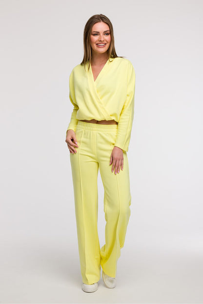 Elegantly draped BeWear wide leg sweatpants showcasing the long, wide leg design and comfortable elastic waistband for effortless movement.