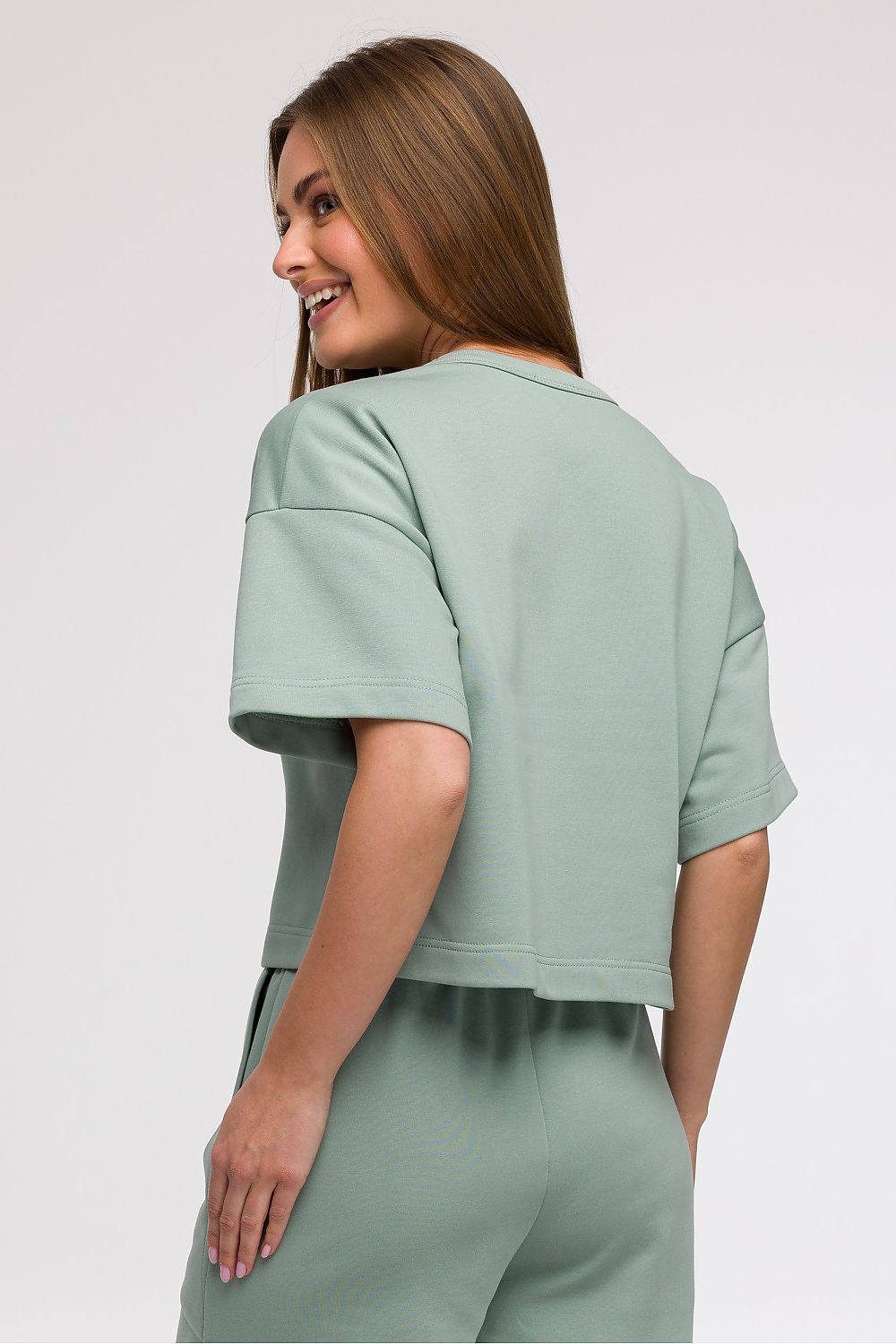 Sophisticated look at BeWear Women's Cropped Blouse crafted in Poland, embodying comfort and elegance with its boxy silhouette and breathable fabric.