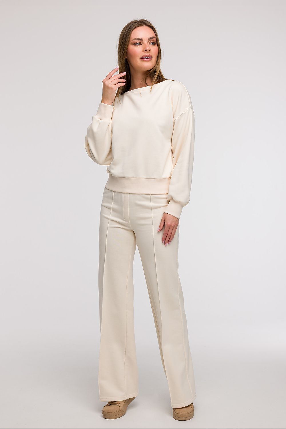 Elegant open back sweatshirt blouse by BeWear showcasing feminine style and comfort, perfect for casual elegance.
