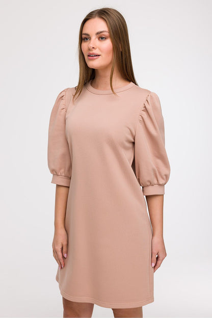 A model wearing the BeWear Elegant A-Line Daydress, demonstrating the flattering fit and romantic silhouette, perfect for a city stroll or holiday getaway.