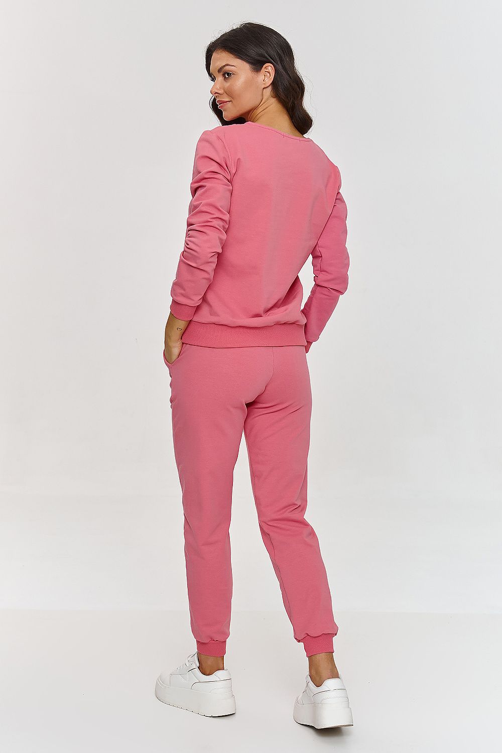 Chic and versatile Women's Tracksuit Set by Makadamia, includes V-neck hoodie and tailored pants, ideal for elegant casual wear.