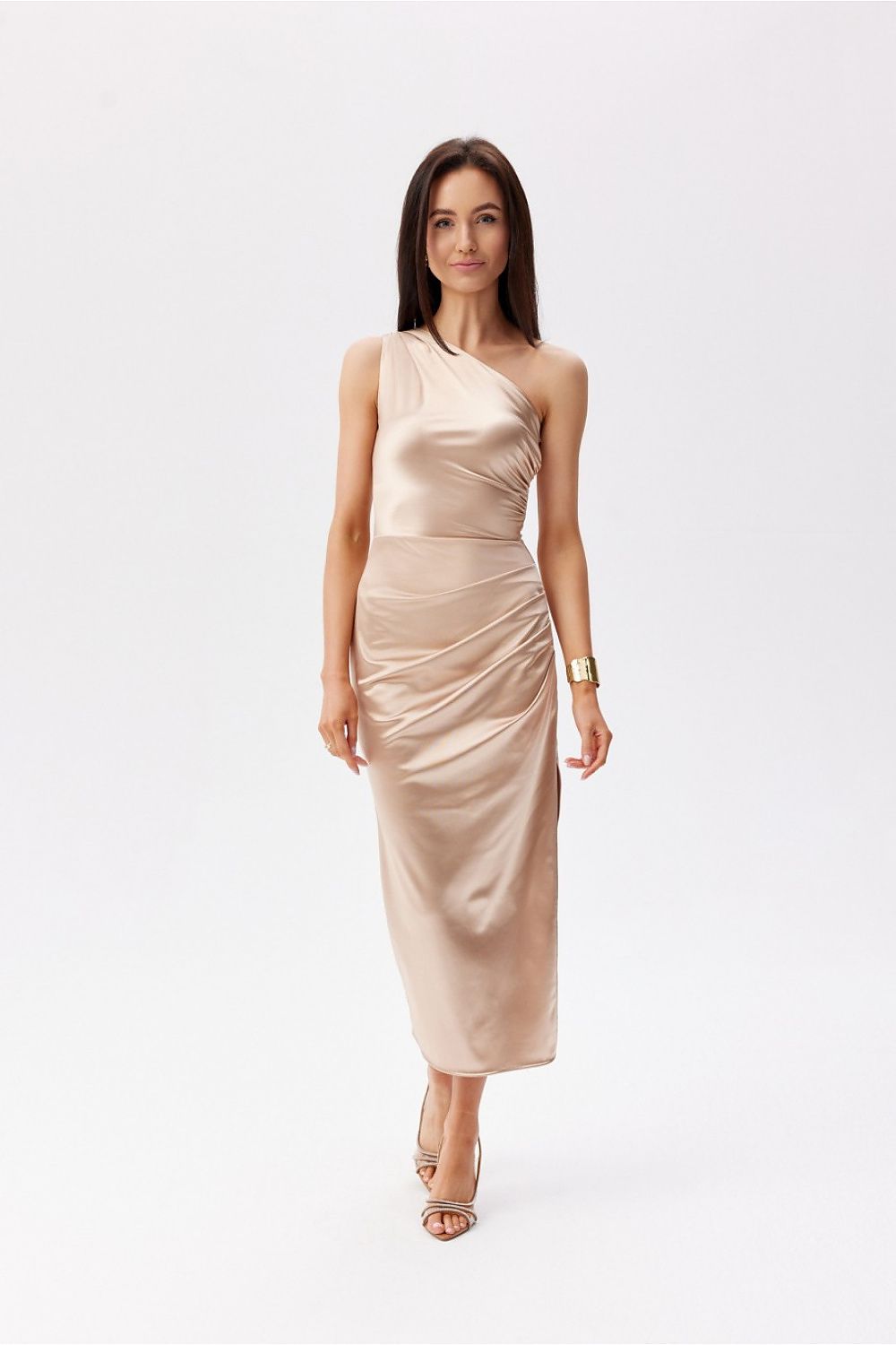 Fashion-forward satin midi dress with a chic asymmetrical design by Roco Fashion, showcasing a daring slit, perfect for a glamorous night out.