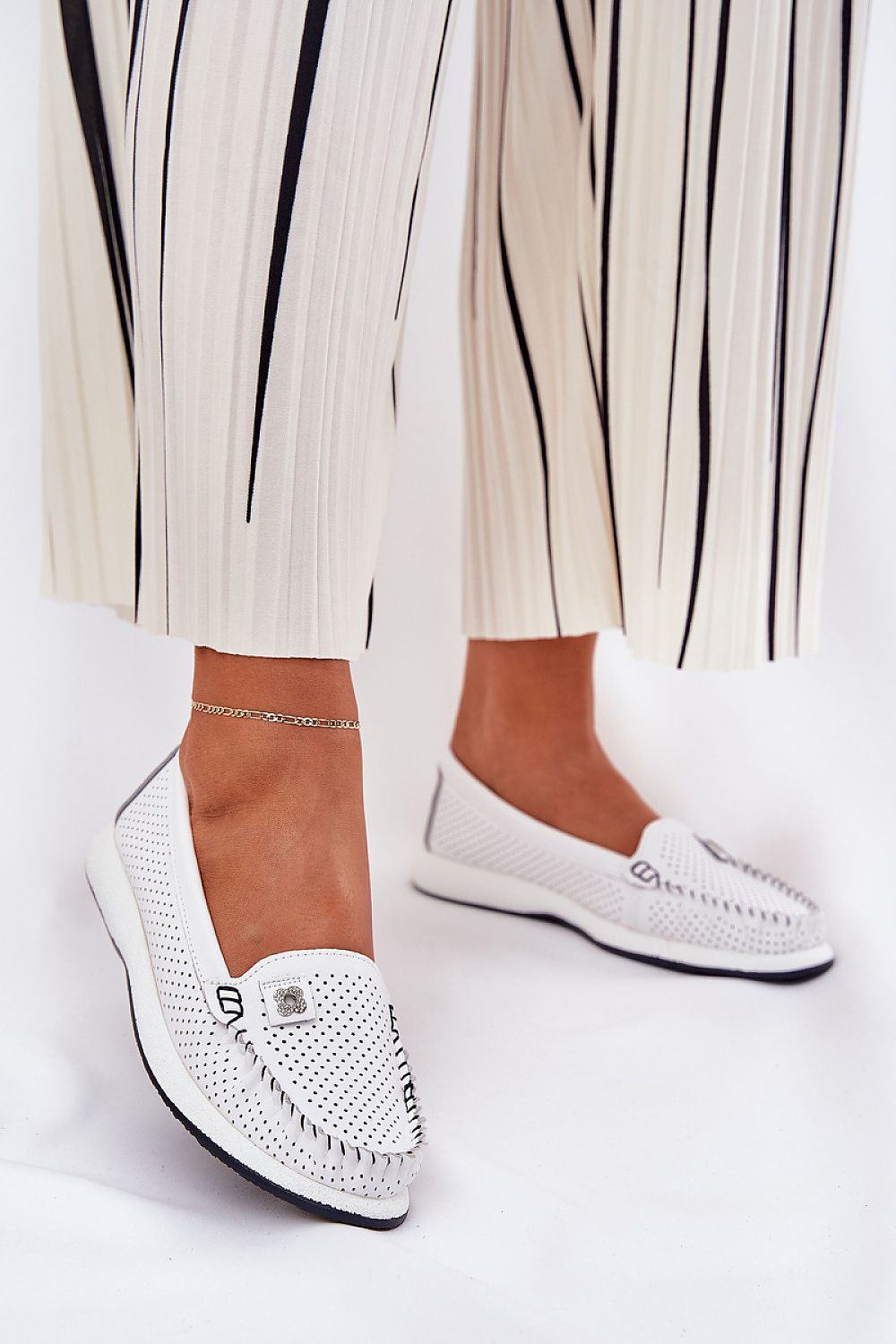 Stunning women's elegant Italian leather loafers by Step in Style, featuring exquisite flower detail and designed for ultimate comfort, available in sizes EU 36-41.