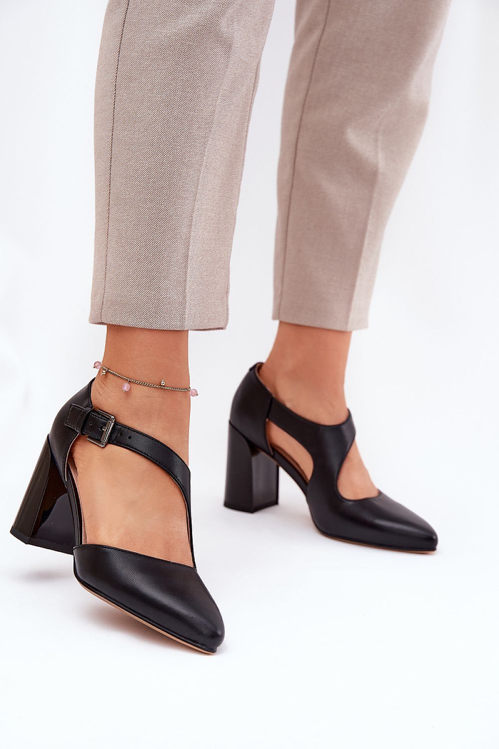 Elegant almond toe block heel pumps by Step in Style, featuring natural leather design for luxury and comfort.