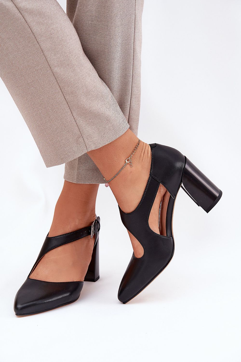 Chic and sophisticated almond toe pumps by Step in Style, crafted from premium natural leather to enhance any outfit.