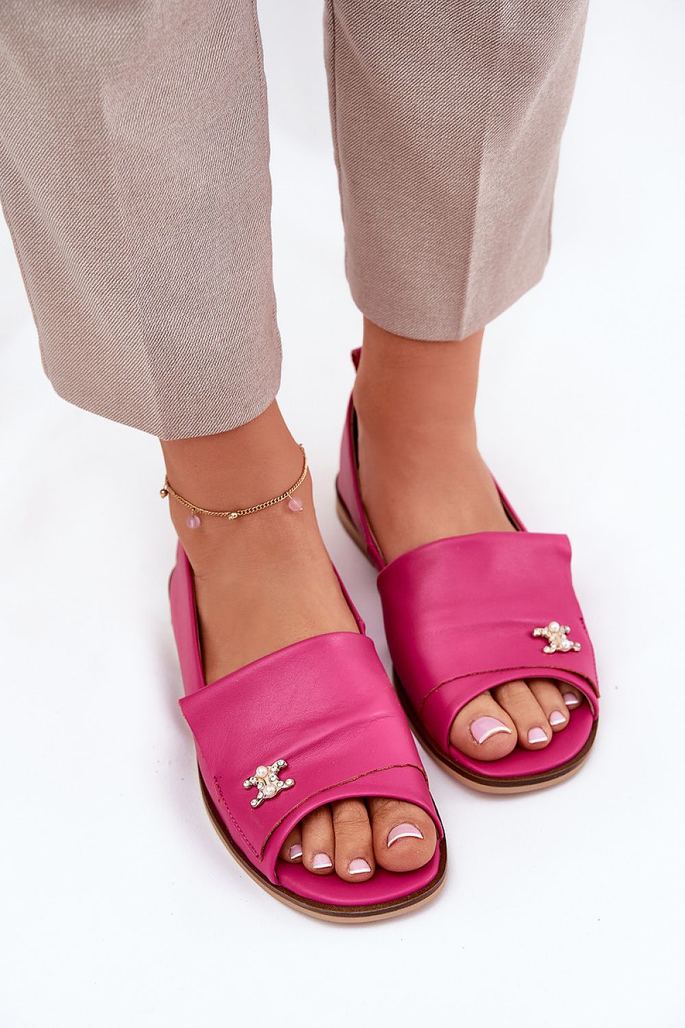 Close-up of luxurious natural leather open-toe ballet flats from Step in Style, highlighting the delicate decoration and premium quality.