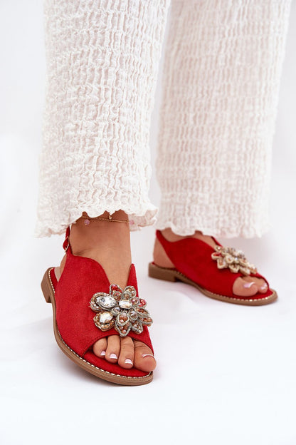 Luxurious eco suede sandals for women from Step in Style, showcasing a stylish flower accent and a comfortable flat heel.