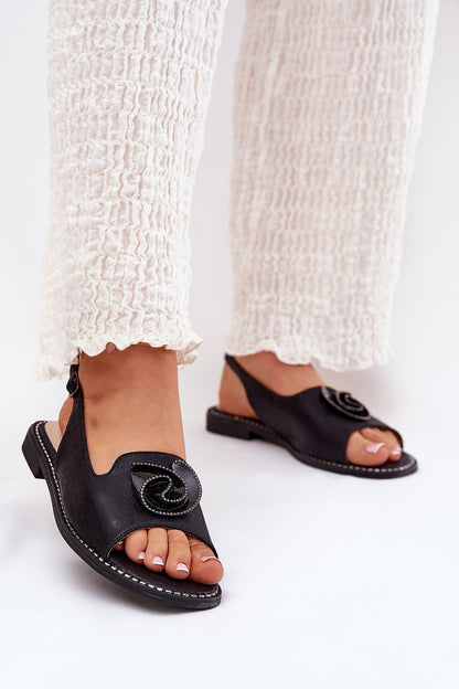 Elegant shiny women's sandals by Step in style, crafted from eco leather for luxurious comfort, featuring a decorative front accent and adjustable buckle.