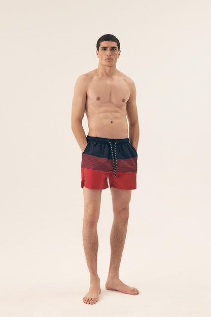 Stylish Henderson swim trunks featuring a modern design, lightweight polyester fabric, and perfect fit drawstrings for a sophisticated summer look.