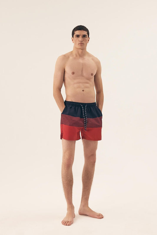 Stylish Henderson swim trunks featuring a modern design, lightweight polyester fabric, and perfect fit drawstrings for a sophisticated summer look.