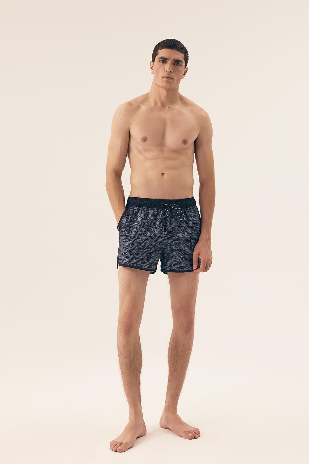 Henderson stylish men's swim trunks with an elastic waistband and practical side pockets, perfect for summer leisure.