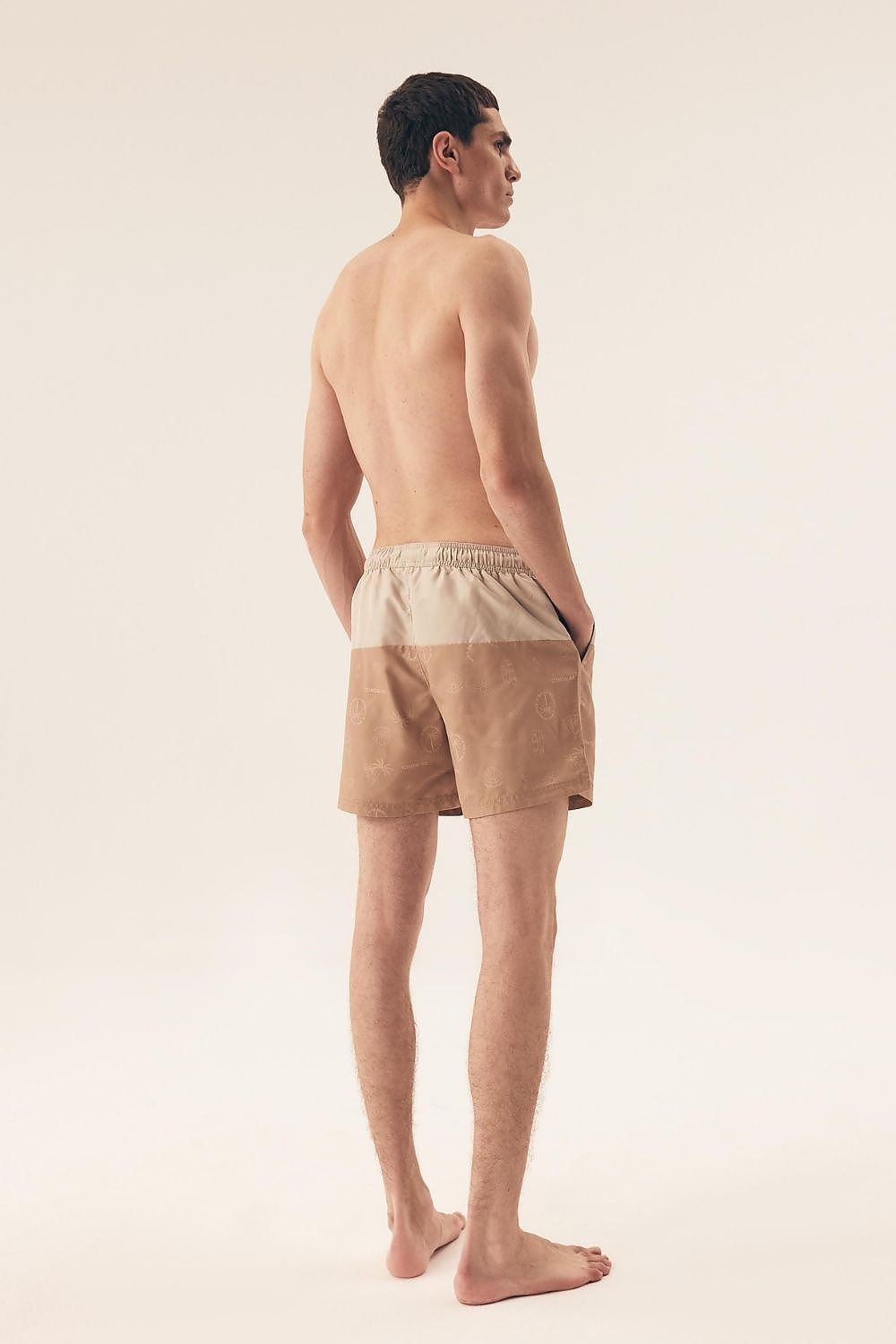 Close-up of Henderson Men's Quick-Dry Swim Trunks showcasing the high-quality quick-drying fabric and adjustable drawstrings, ideal for stylish summer activities.