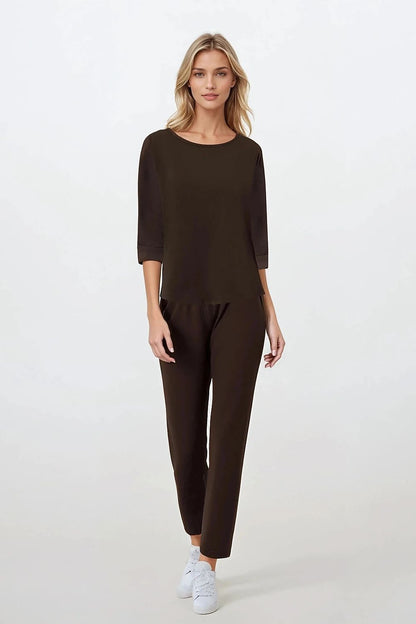 Elegant Women's 2-Piece Pajama Set by Momenti Per Me, featuring a soft cotton blend design with 3/4 sleeves and a U-neckline, perfect for luxurious nightwear and home relaxation.