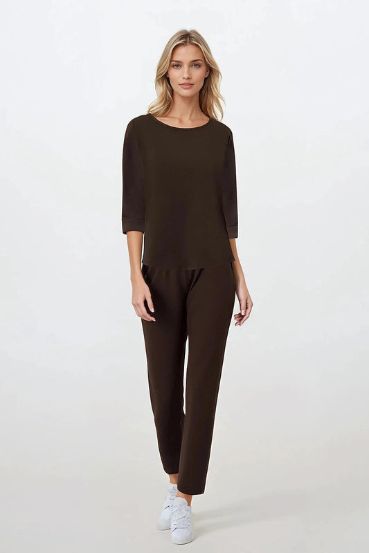 Elegant Women's 2-Piece Pajama Set by Momenti Per Me, featuring a soft cotton blend design with 3/4 sleeves and a U-neckline, perfect for luxurious nightwear and home relaxation.