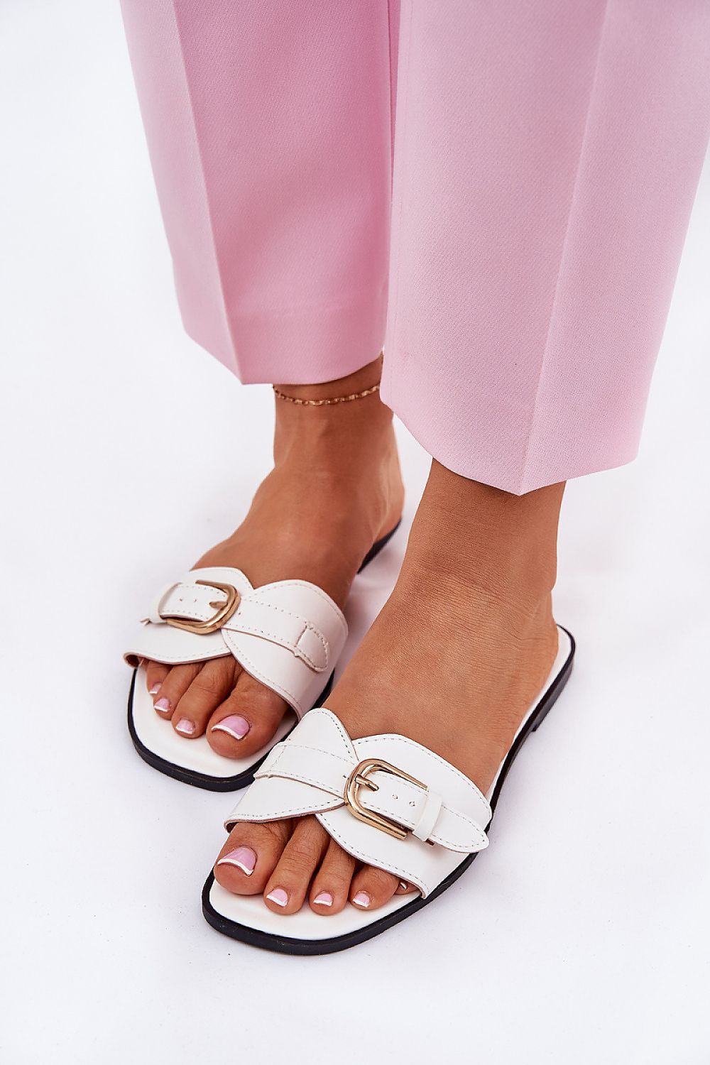 Step in Style women's eco leather sandals displayed on a sandy beach, ideal for summer wear and casual elegance.