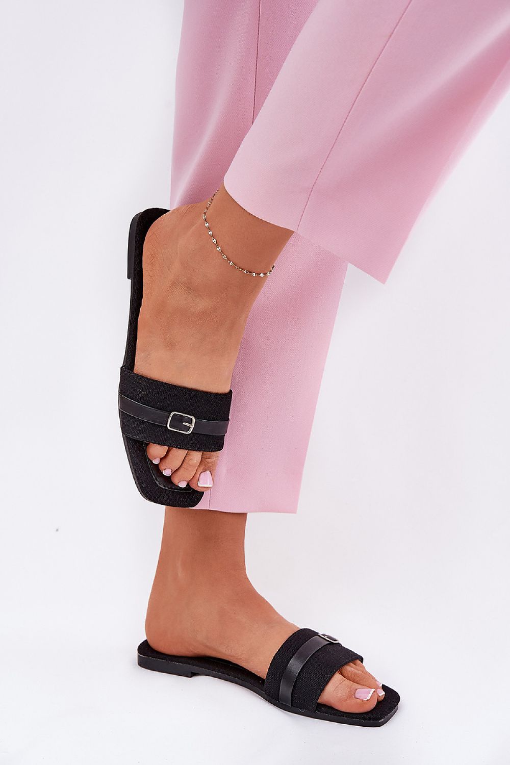 Stylish and comfortable luxury women's flip-flops with adjustable buckle by Step in style, ideal for pairing with light summer garments.