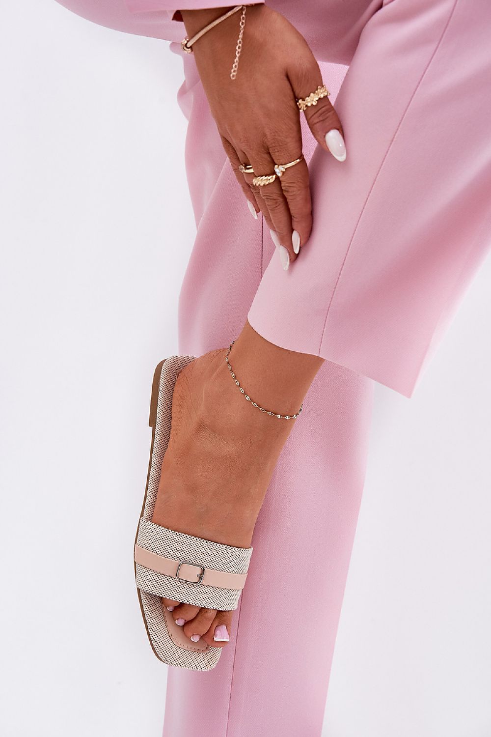 Chic and comfortable women's flip-flops by Step in Style, made from breathable textile materials with a stylish buckle.