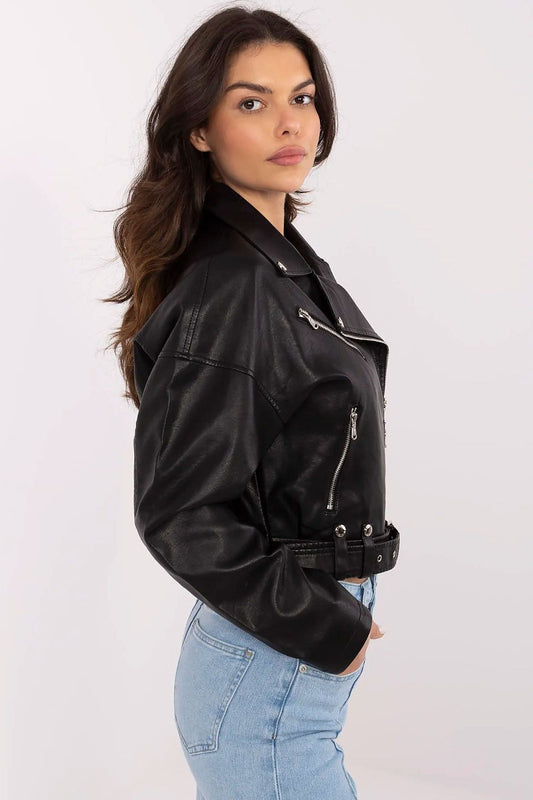 Women's faux leather jacket with belt by MBM, featuring a stylish urban design, smooth texture, and practical zippered pockets, ideal for transitional seasons.