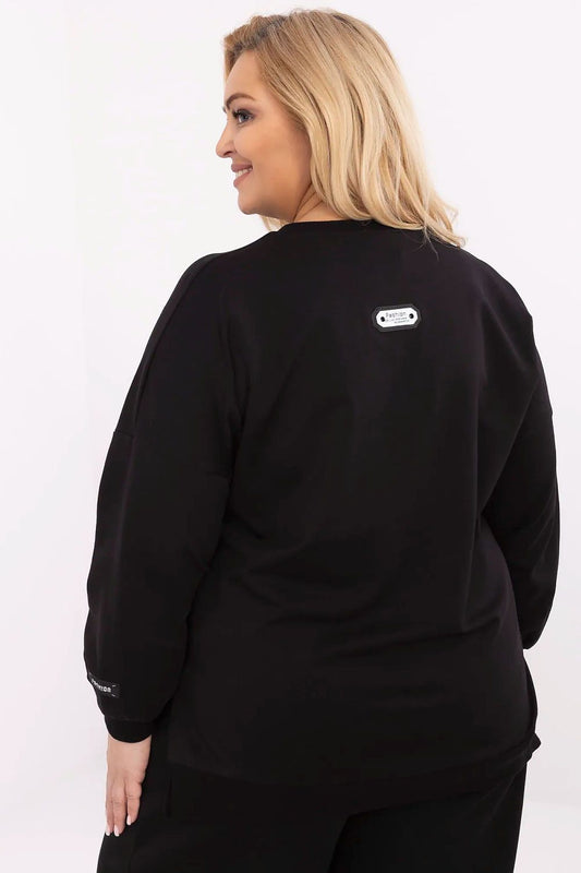 Close-up of the soft cotton blend fabric of Relevance plus size casual sweatshirt, highlighting its luxurious feel and stylish design.