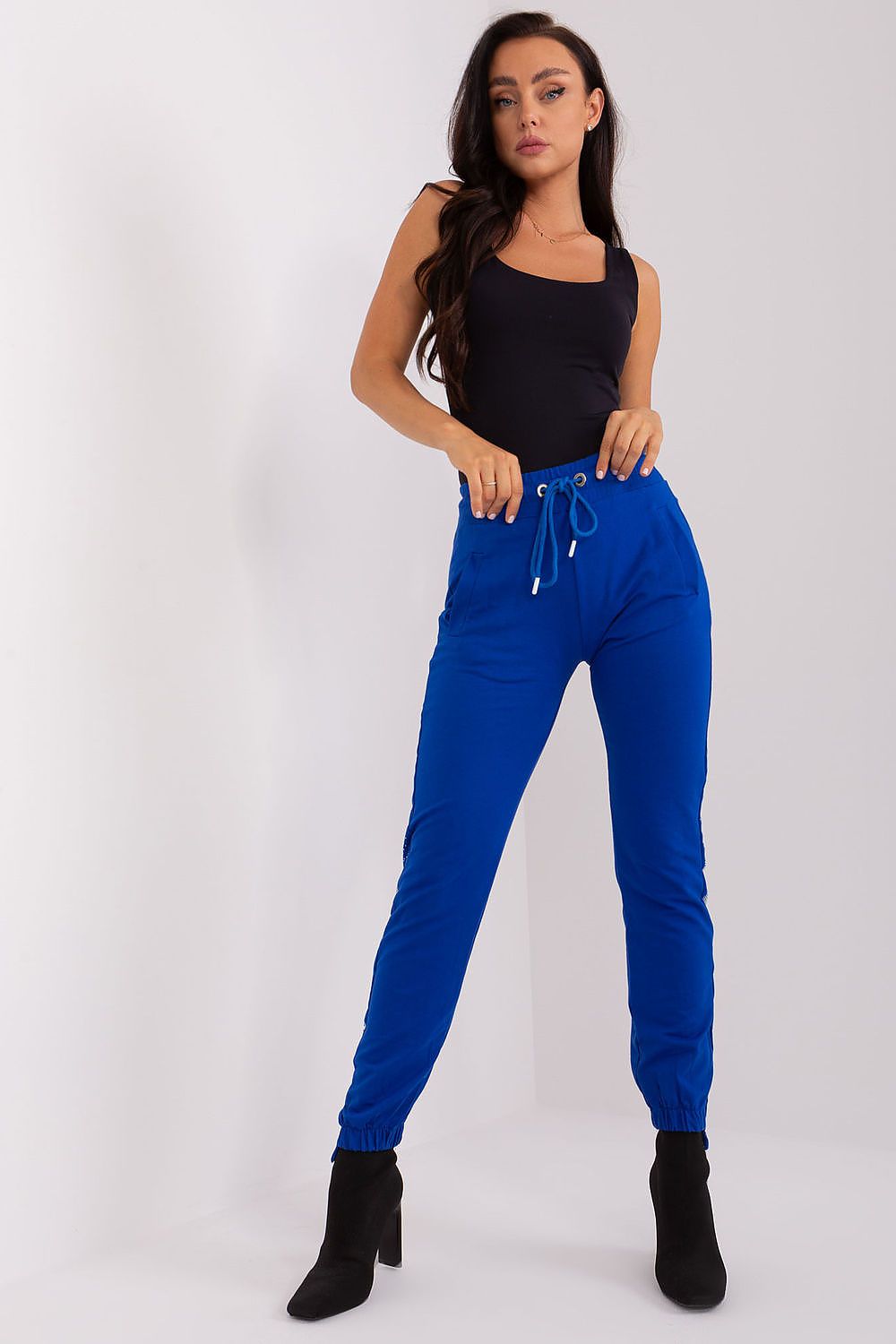 Luxury women's high-waisted casual sweatpants by Relevance featuring stylish print and delicately placed studs, ideal for comfortable everyday wear.