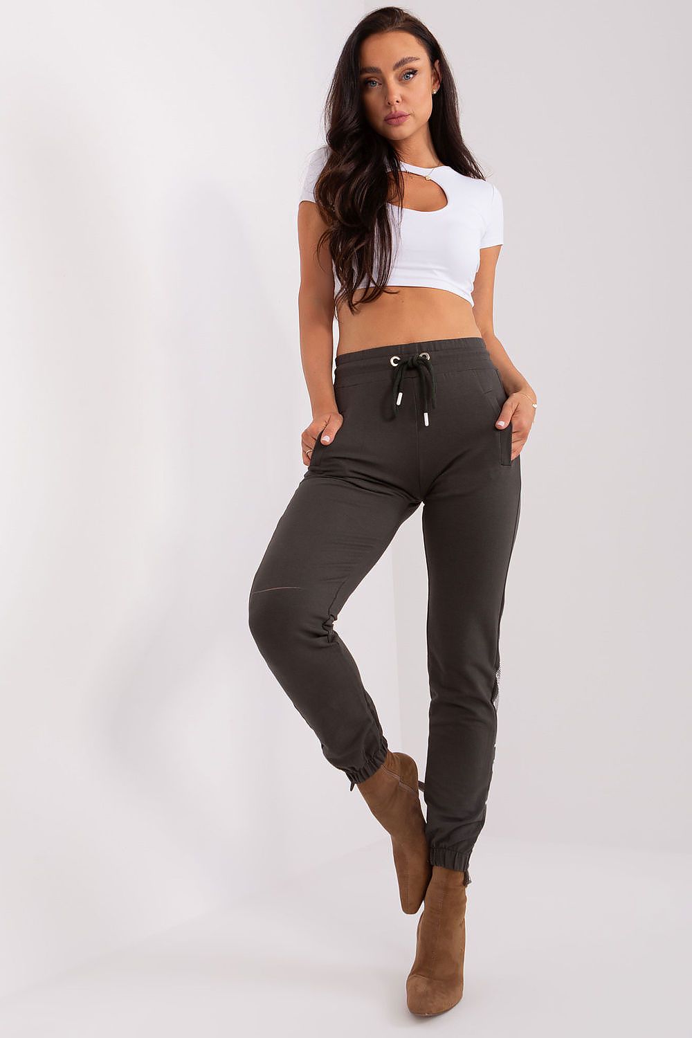 Close-up of Luxury Women's High-Waisted Casual Sweatpants by Relevance showcasing the soft cotton fabric and exquisite stud detailing.