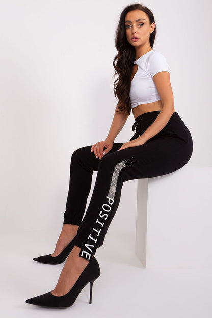Stylish side view of Luxury Women's Casual Sweatpants by Relevance, equipped with practical pockets and elastic cuffs for a sporty look.