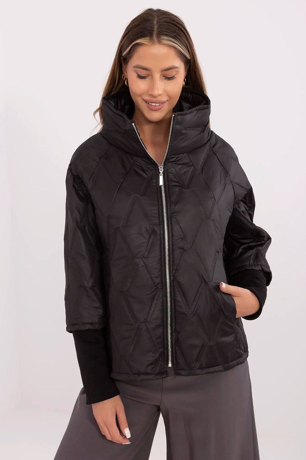 Close-up view of the luxurious quilted texture on the Women's Transitional Jacket by Italy Moda, perfect for everyday elegance.