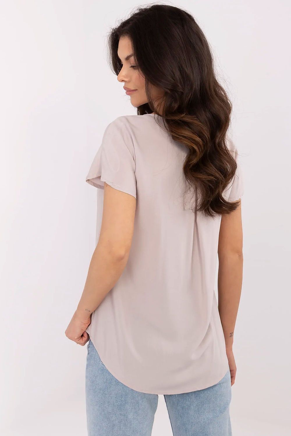 Elegant Sublevel viscose blouse in a soft, breathable fabric perfect for warmer days, showcasing a feminine V-neckline and short sleeves.