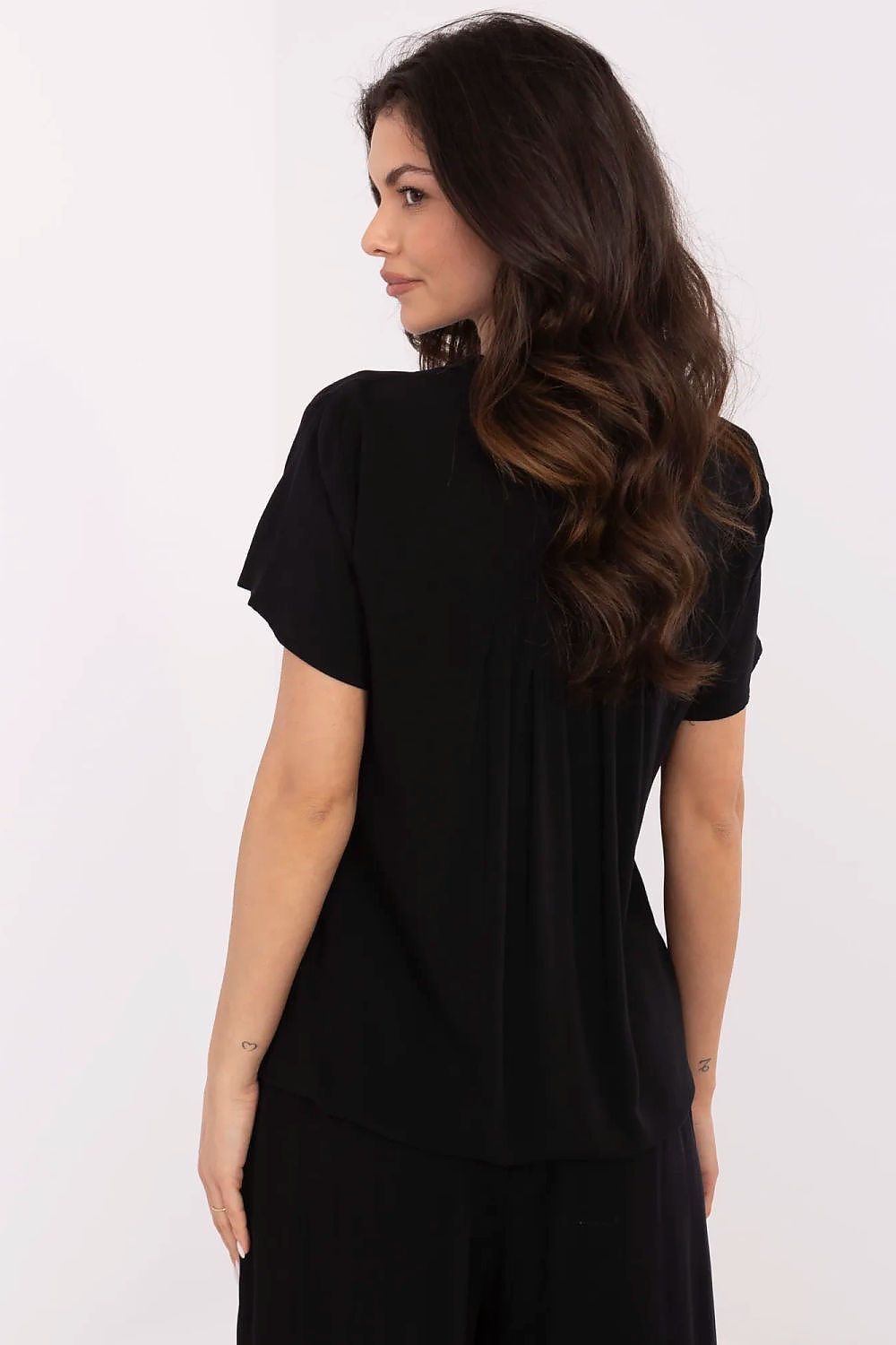 Fashion-forward short-sleeve blouse by Sublevel, showcasing an environmentally conscious design for effortless chic.