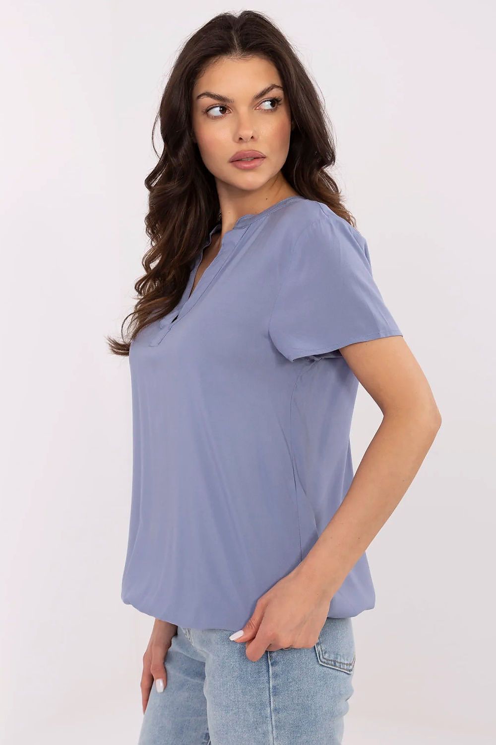 Elegant eco-friendly viscose blouse by Sublevel, showcasing a stylish V-neck and stand-up collar design in a delicate, breathable fabric for casual summer wear.