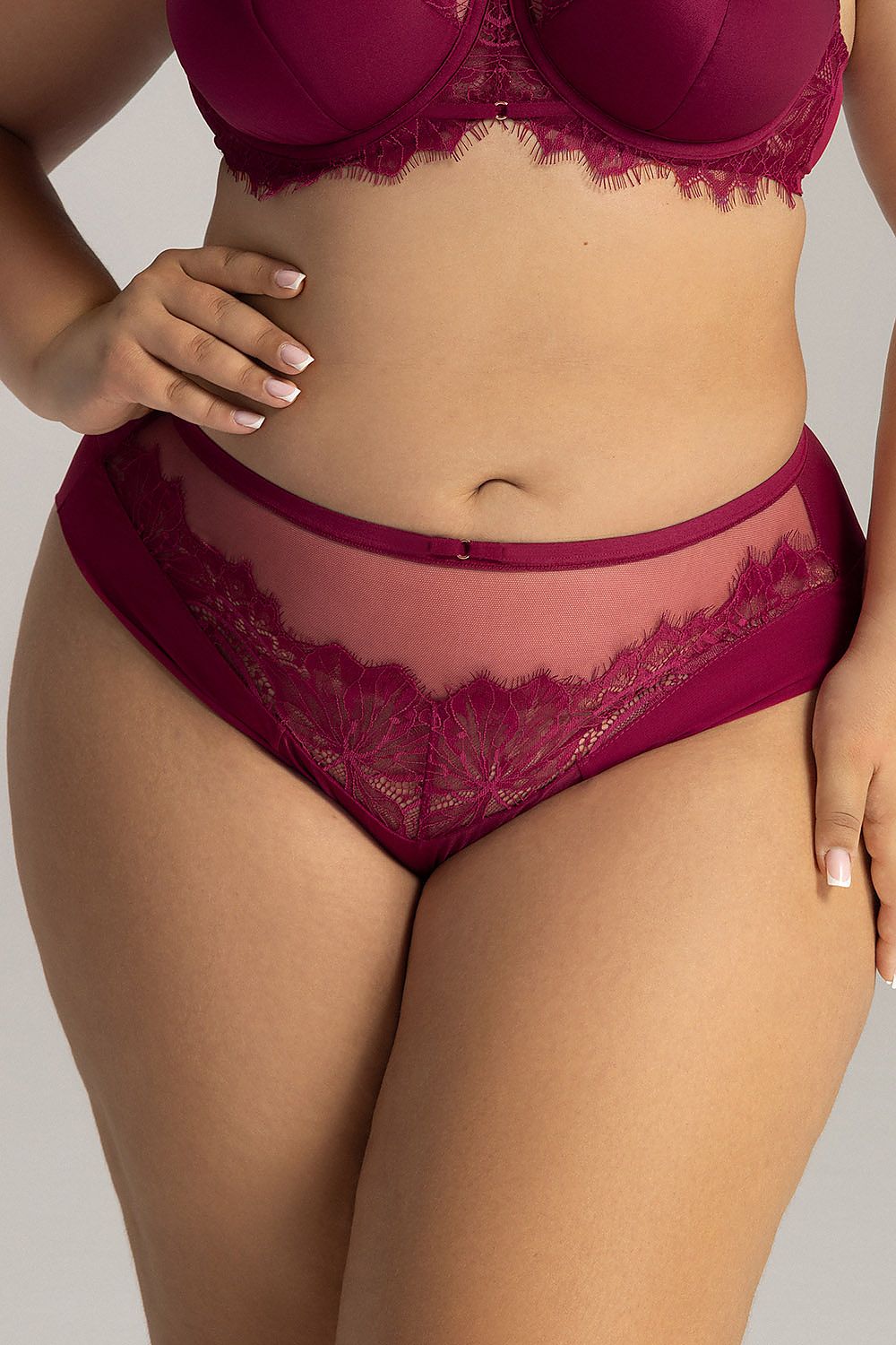 Luxury Brazilian panties by Ava in delicate lace and mesh detailing, showcasing elegance and comfort.