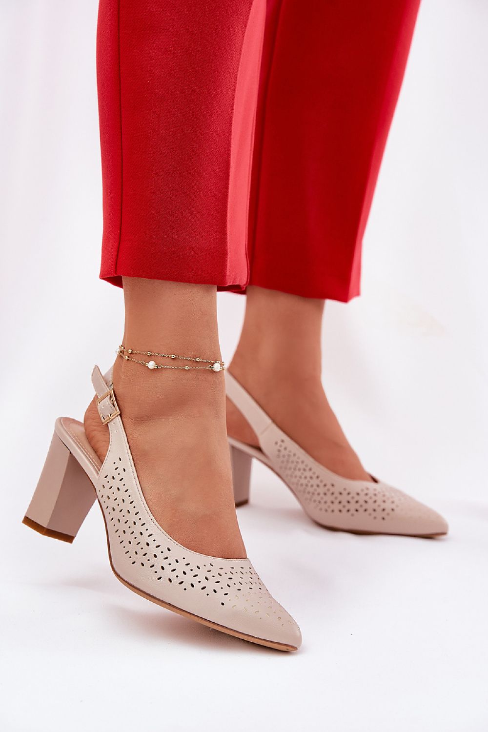 Refined eco-leather women's heel sandals showcasing a stunning lace pattern, adjustable strap for comfort, by Step in Style.