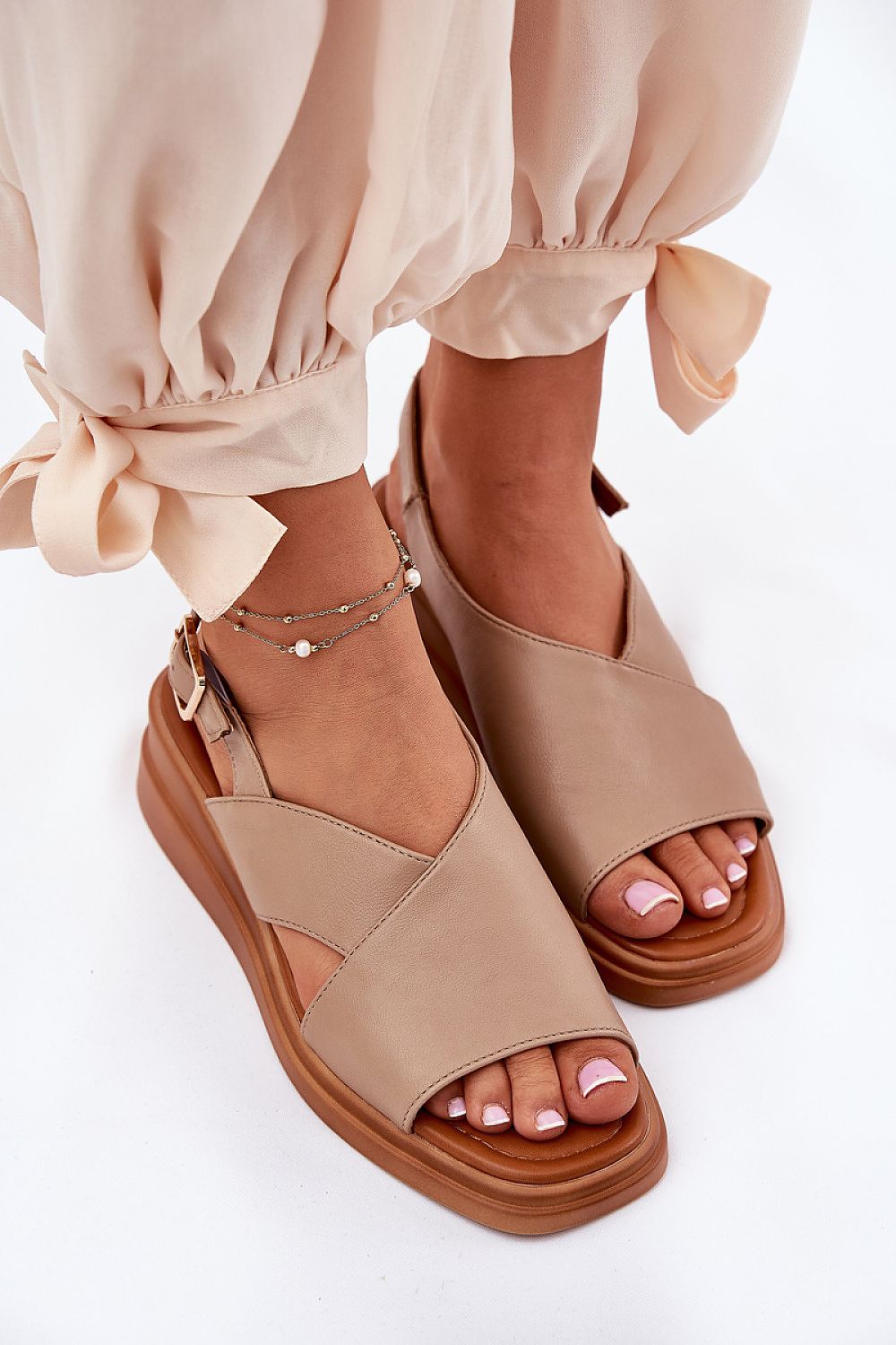 Fashionable Jezzi Women's Eco Leather Wedge Sandals, perfect for warm weather, providing elegance and versatility.