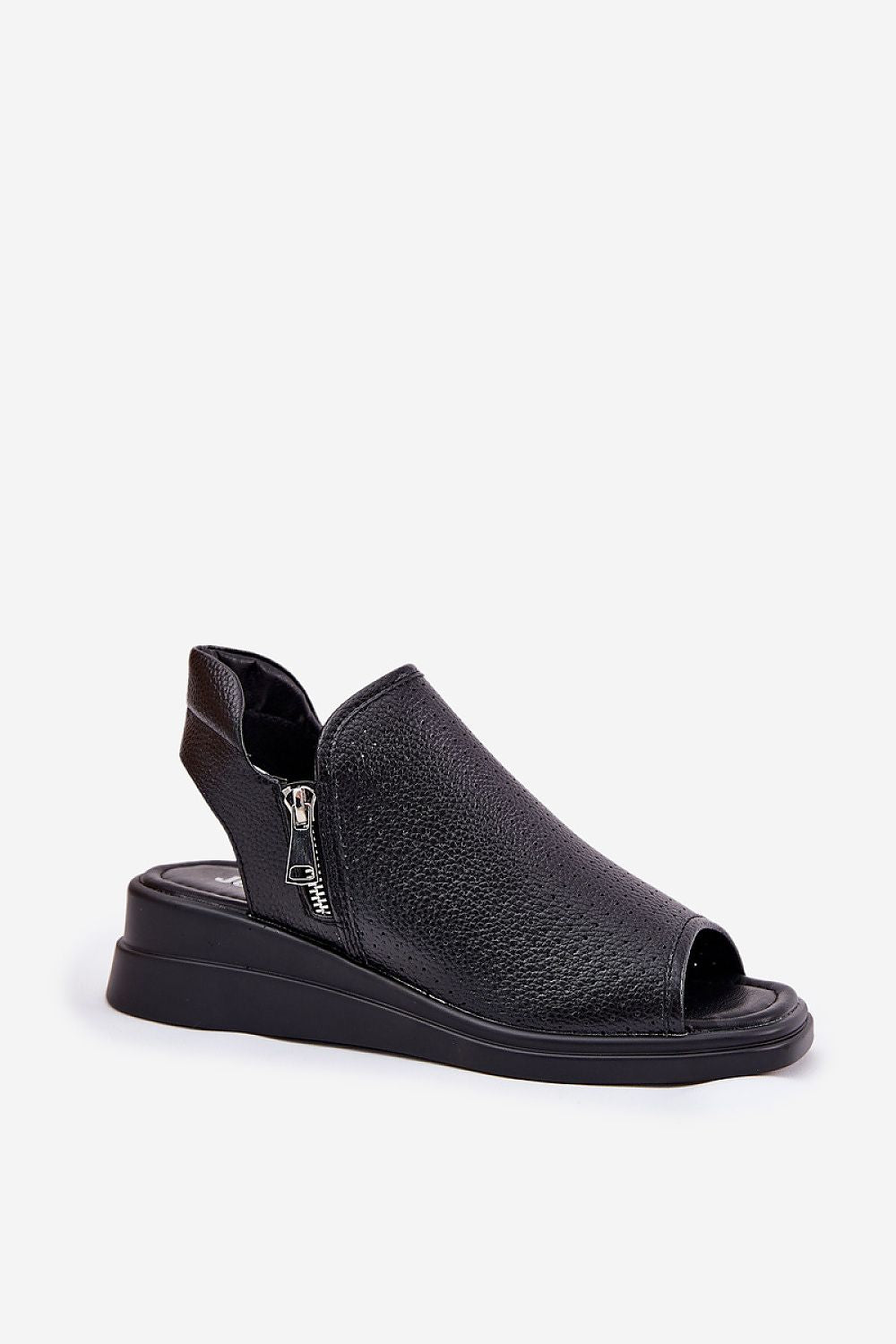 Step in Style presents Jezzi's stylish eco leather sandals showcasing a chic wedge heel design, ideal for fashionable women.