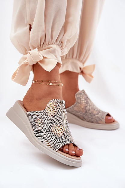Lifestyle image of Step in Style elegant eco leather wedge sandals paired with a summer dress, showcasing versatility in warm weather outfits.