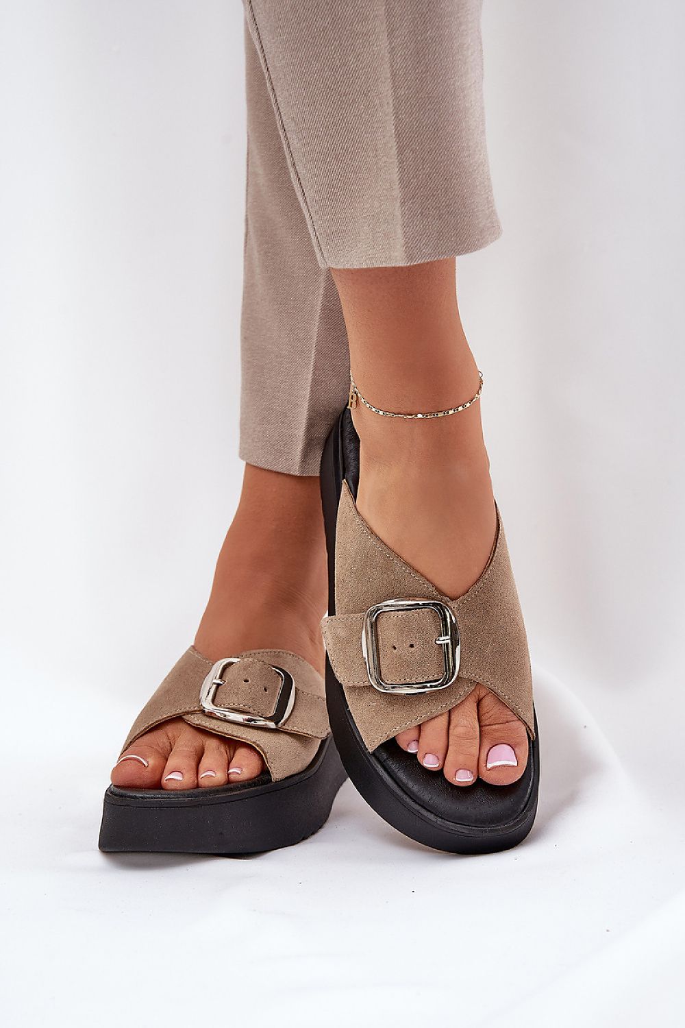Elegant women's suede sandals with a large adjustable buckle, designed by Step in Style for a chic summer look.