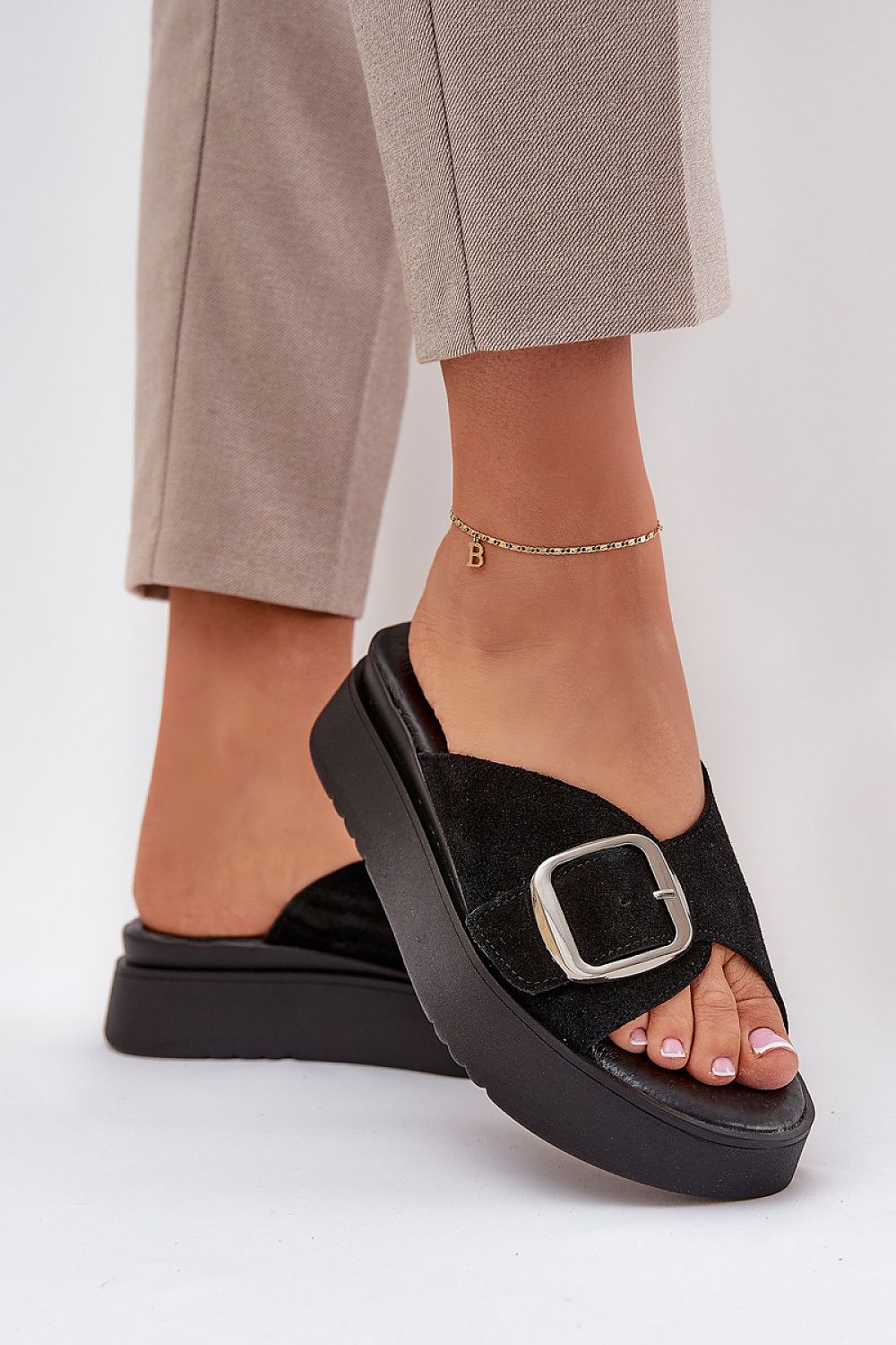 Stylish platform suede sandals for women in elegant design by Step in Style, showcasing an adjustable strap for a personalised fit.