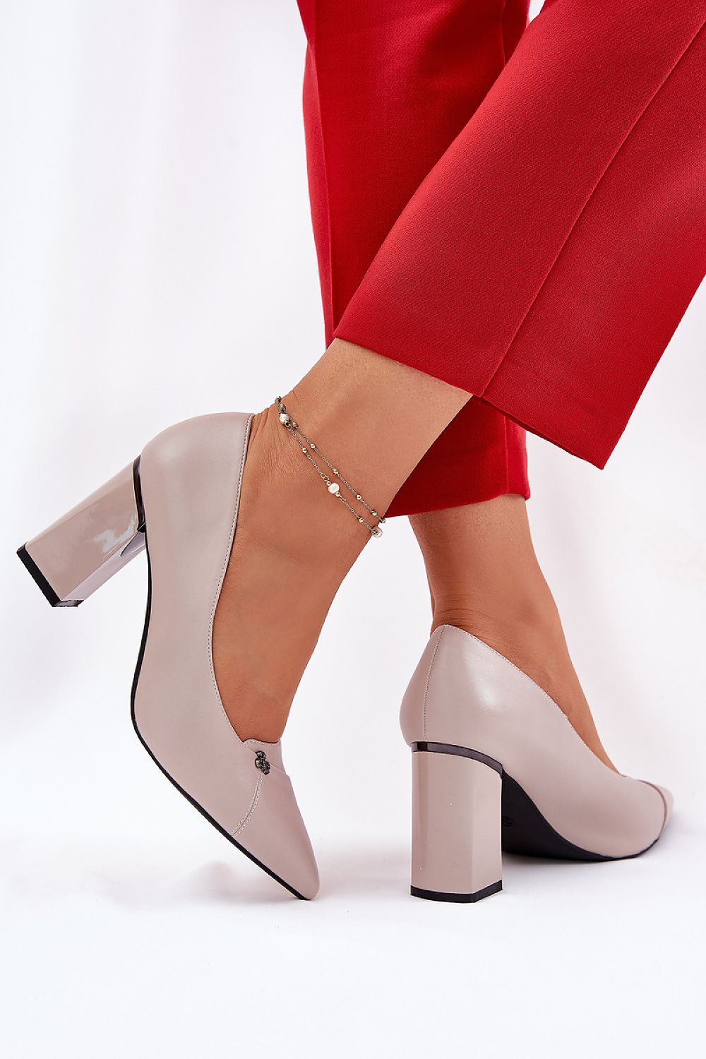 Stylish block heel pumps crafted from eco leather, featuring a refined pointed toe design, offered by Step in Style for graceful occasions.